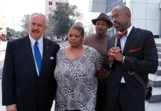 Private Investigator T.J. Ward, Freda Waiters, and Community Activist Marcus Coleman (Front L to R) after meetng with Acting US Attorney John Horn at Atlanta's Richard B. Russell Federal Building.
