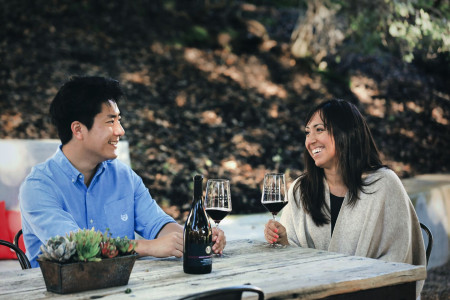 Couple enjoying wine in Santa Maria Valley, at Andrew Murray Winery