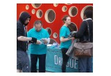 Volunteers take their message directly to local residents at a drug information booth in the heart of Brussels.