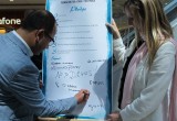 A London city councillor signs the Drug-Free World pledge to live a drug-free life.