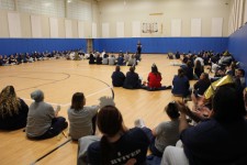 Comedian Muffy performs for inmates.