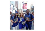 Youth delegates to the 13th annual International Human Rights Summit with their human rights educational materials at Times Square New York.
