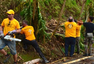 Scientology Volunteer Ministers clearing up the damage from Hurricane Maria
