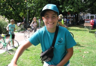 Young anti-drug volunteer and cyclist, ready for a day of fun while he promotes drug-free living 