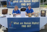 Volunteers from the Church of Scientology Seattle manned the Youth for Human Rights booth at the Kent International Festival