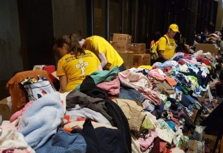 Scientology Volunteer Ministers sort donations at Lakewood Church shelter 