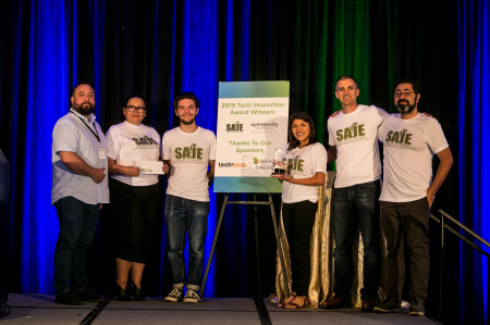 Strategic Action for a Just Economy (SAJE) Accepts the 2019 TIA Award