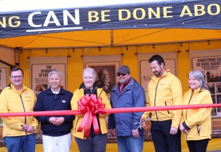 Opening the bright yellow pavilion