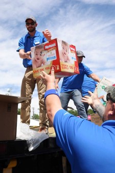 Volunteers Distribute Diapers to Nonprofits in Need 