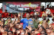 Augustine in the blue Youth for Human Rights T-shirt at an event in his province in Papua New Guinea
