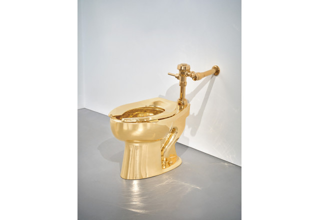 Solid Gold Toilet by Maurizio Cattelan