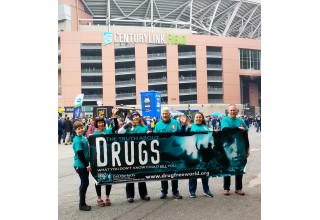 The Drug-Free-World volunteers brought their drug prevention campaign to CenturyLink field on a game night to share the program with Seahawks fans