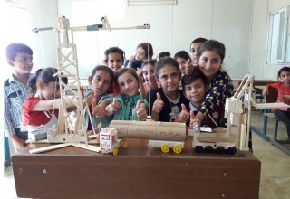 Iraqi students solve problems and learn how to create through the STEM program.