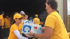 As part of the Scientology Volunteer Ministers team in Rockport, Texas, Kerri Kasim helps organize donated water to distribute to the community.