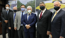 (Pictured Left to Right) Almirante Silvio Starling, Phillip Newton, Cris Pinto, Minister Marcos Pont