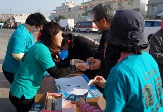 An information stand, where volunteers distribute The Truth About Drugs booklets and encourage people to pledge to live drug-free lives.