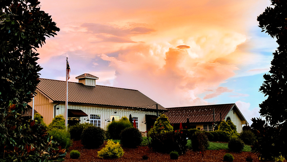 Dramatic sunset at Spinning Leaf wedding and event venue