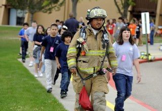 Pueblo County School District 70 conducts a school evacuation exercise with local firefighters at Liberty Point Elementary School, Pueblo, Colorado.
