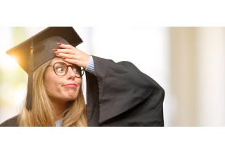 College Graduate with Overwhelmed Expression