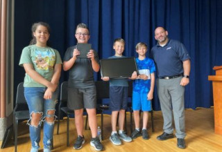 Students Who Successfully Graduated Were Gifted a Free Computer