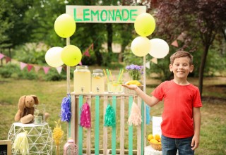 Boy Selling Lemonade