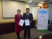 Ms. Selina Luo, Director of CTIP and Chapter President of CTIP China and Mr.Yao Wang, Vice-Chairman of CCPIT showing the signed Agreement.