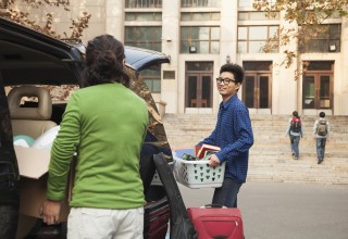 College Student Moving into Dormitory