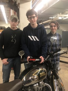 BUILD Moto students accepting the first delivery
