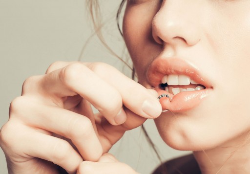 Sacramento Dentistry Group Answers: Do Lip Piercings Cause Bad Breath?