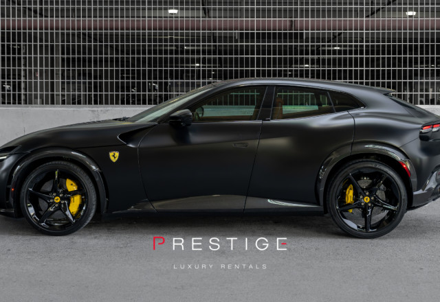 Black Ferrari Purosangue front view at Prestige Luxury Rentals in Miami