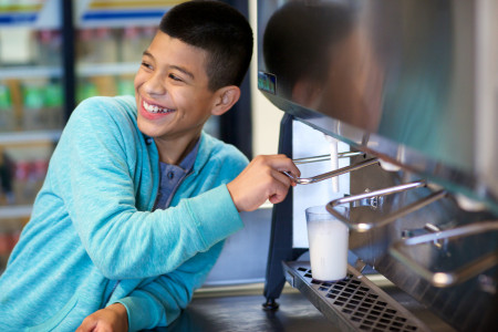 Boy at Bulk Milk Dispenser