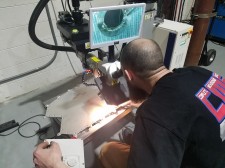 Part being repaired at CMS on new LaserStar 8700-3 fiber laser welding workstation