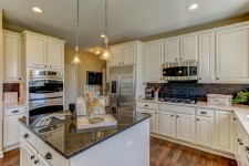 Designer kitchen showcased in a K. Hovnanian® home at The Estates Of Fox Chase in Oswego