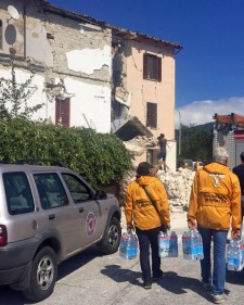 Scientology Volunteer Ministers from Procivicos (Civil Protection Team of the Scientology Community), carrying bottled water to survivors of Wednesday's deadly Italy quake