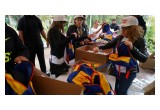 Holiday Heroes Volunteers Packing Backpacks for LA's Homeless Children