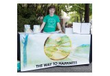 A volunteer welcomed neighbors to a block party organized by the Church of Scientology Seattle and the Seattle chapter of The Way to Happiness Foundation.