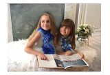Hand-knit scarves for children made by owner Nataliya and her mother Olga