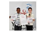 Argent Bala (right), winner in the Youth for Human Rights Art Competition 7 to 9 age group, with a friend and fellow contestant.