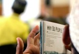 Workshop attendee reads The Truth About Drugs booklet