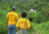 Scientology Volunteer Ministers approach a village in the rain forest inland from the Amazon.
