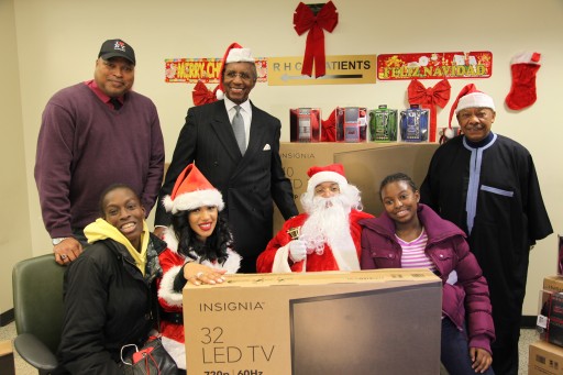 Harlem Families Receive Flat Screen TV's at the World's Brand Freedom of Giving Event