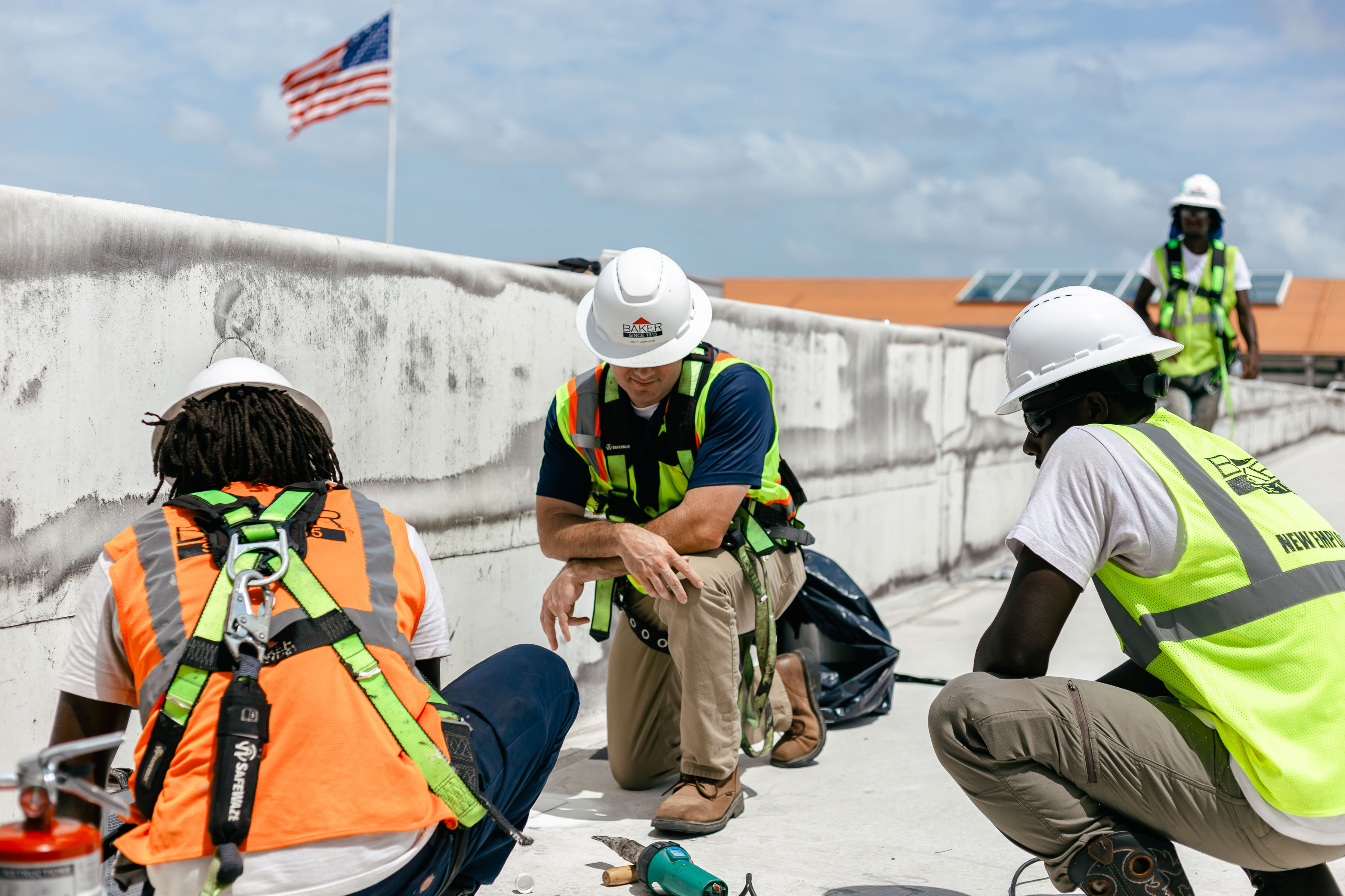 Baker Roofing Company Working on a Commercial Roof