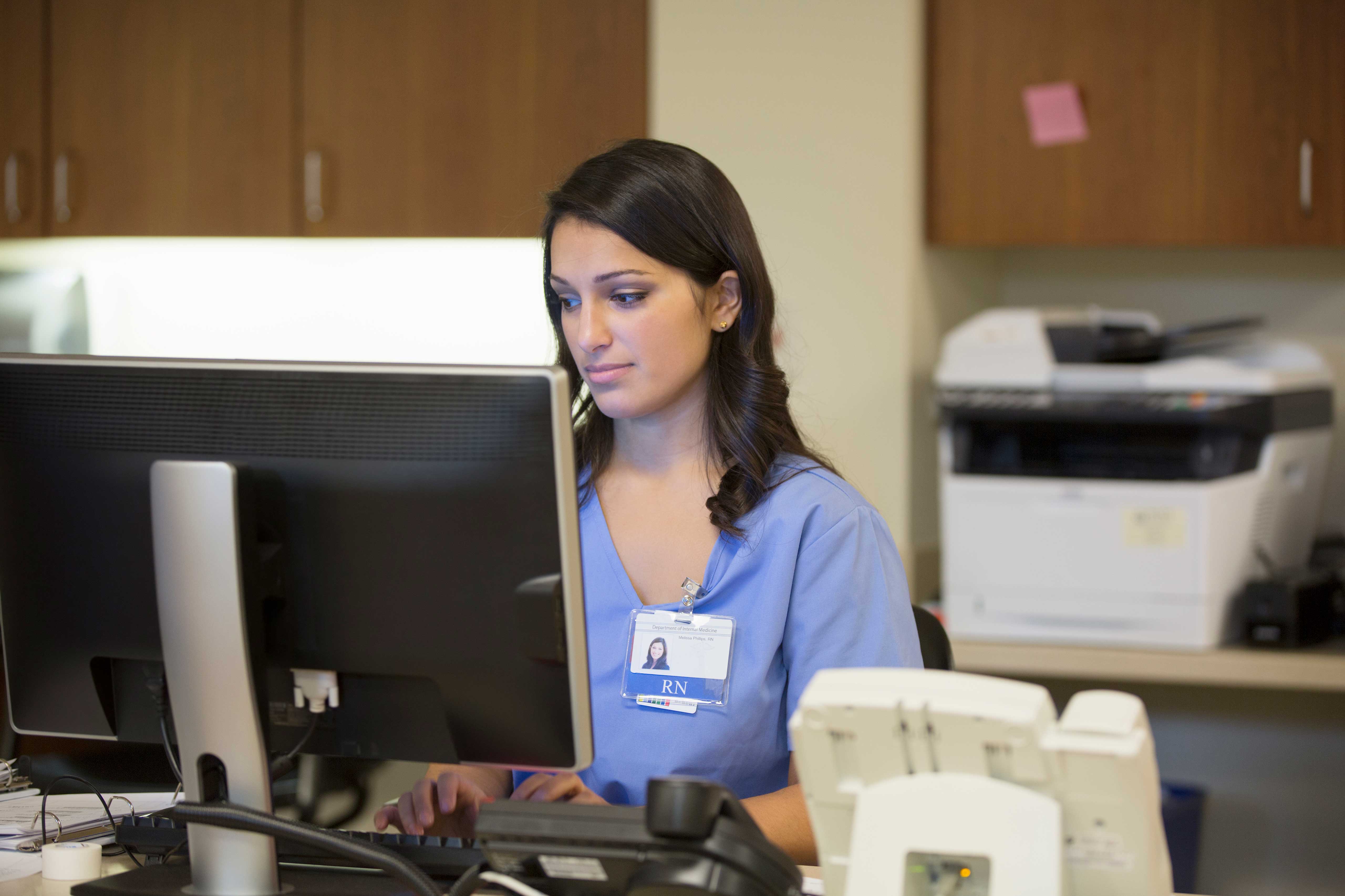 Nurse on computer