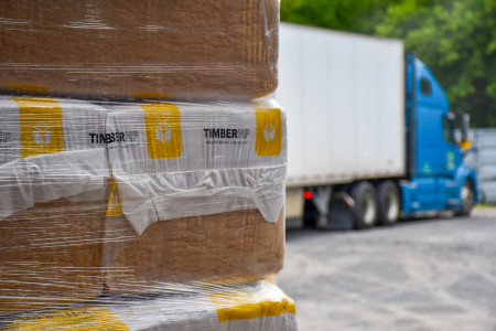 New Energy Works receives the first shipment of wood fiber insulation made in the United States.