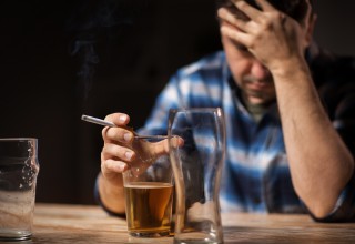 Drinking and Smoking as Coping Mechanisms to Deal with Financial Stress