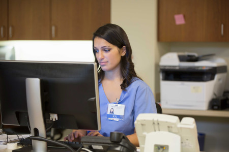 Nurse on computer