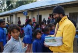 Volunteer Ministers presented notebooks to every school-aged child in the village of Aaru Pokhari.