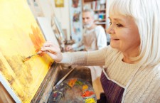 Older Woman Enjoying Painting
