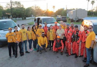 Scientology Volunteer Ministers and Los Topos (the Moles) search and rescue team working together to help Rockport recover