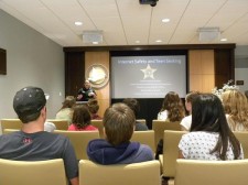 Pinellas County Deputy Sheriff briefed Clearwater teens on how to protect their privacy and prevent cyberbullying at a workshop at United for Human Rights Florida headquarters in downtown Clearwater.